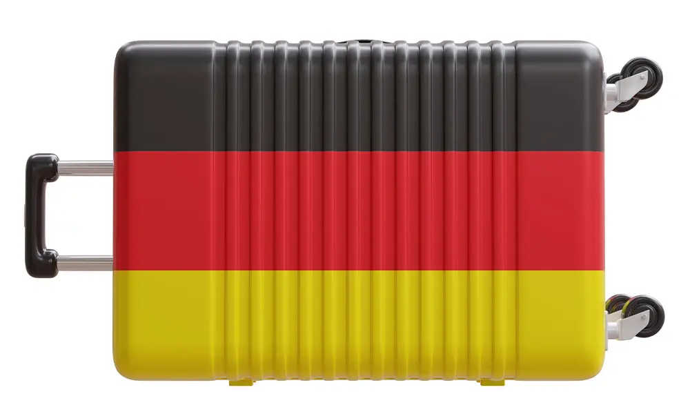 Travel suitcase with the German flag design, symbolizing travel to Germany.
