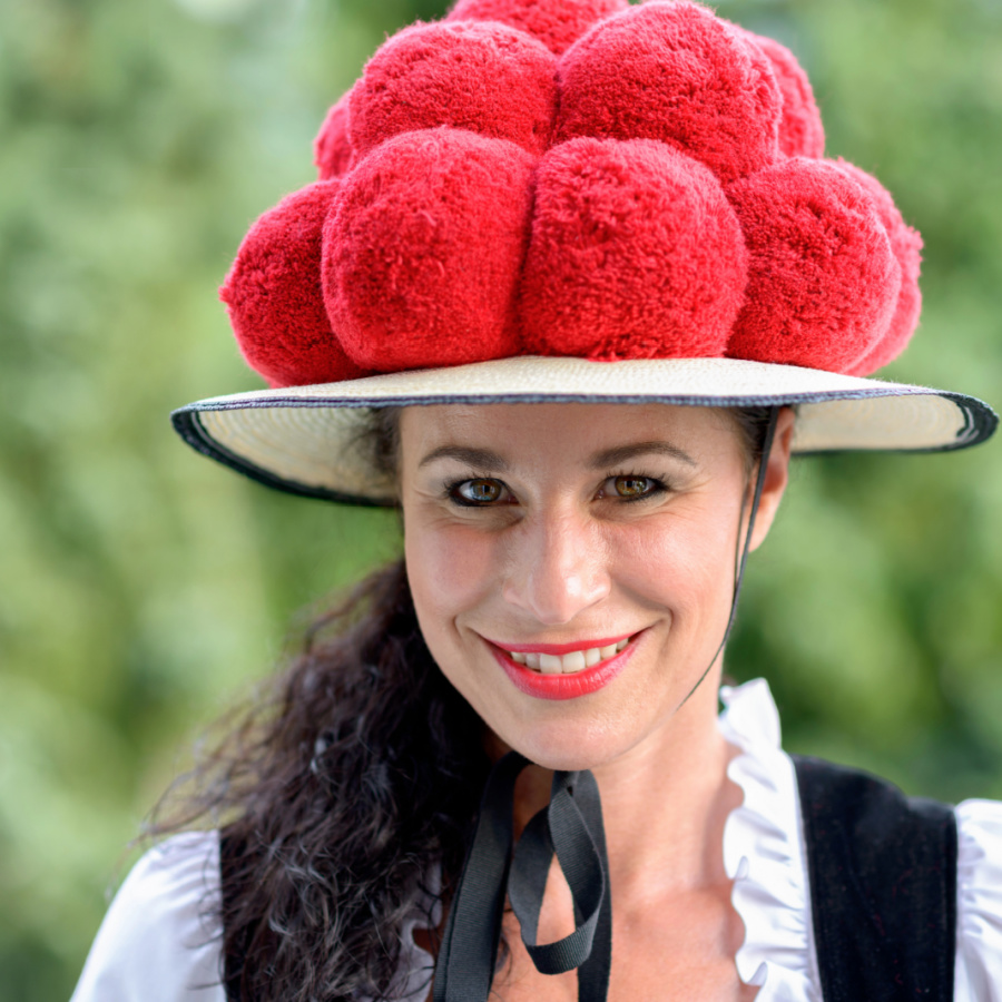 Bollenhut (Pompom hat) worn by women in Baden-Württemberg, Germany Bollenhut (Pompom hat) worn by women in Baden-Württemberg, Germany