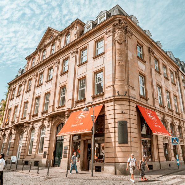Stone building housing the Farina Fragrance museum on street corner in Cologne, Germany