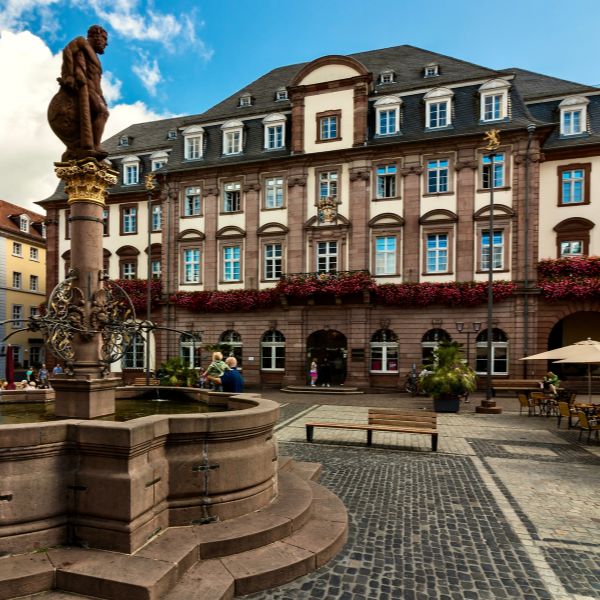 Fountain with statue in front of the Heidelberg Town Hall