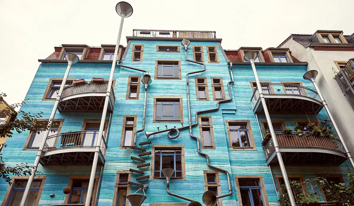 Kunsthofpassage Blue façade with artistic drainpipes at Kunsthofpassage in Dresden Neustadt, Germany