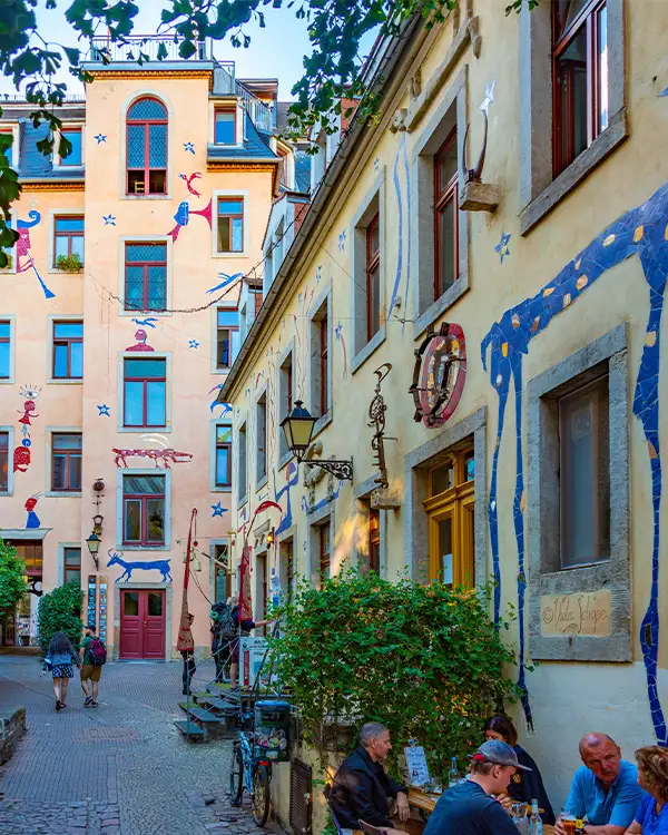 Kunsthofpassage Whimsical courtyard murals and outdoor café at Kunsthofpassage Dresden