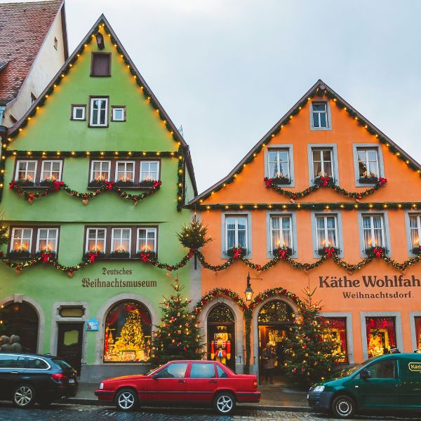 Green and Orange buildings housing the Rothenburg Christmas Museum and Käthe Wohlfahrt Chistmas shop.