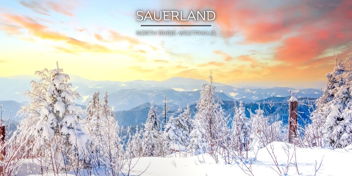 Saureland region of North Rhine-Westphalia Sunrise with snow-covered trees overlooking the Saureland region of North Rhine-Westphalia