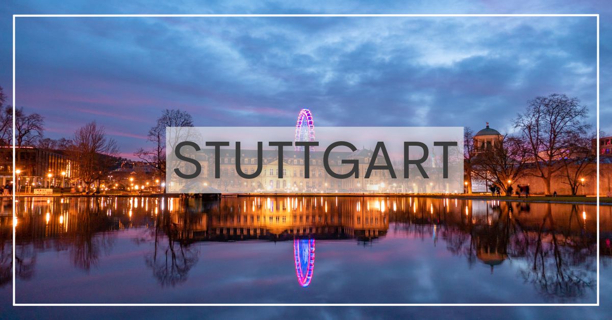 Stuttgart palace and ferris wheel at dusk