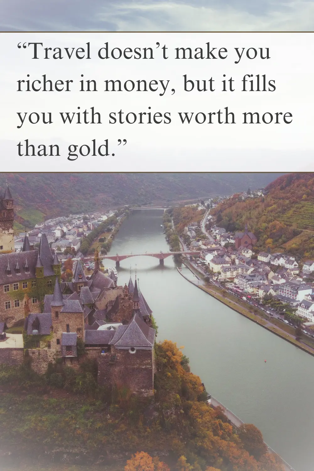 A scenic aerial view of a historic castle along a winding river