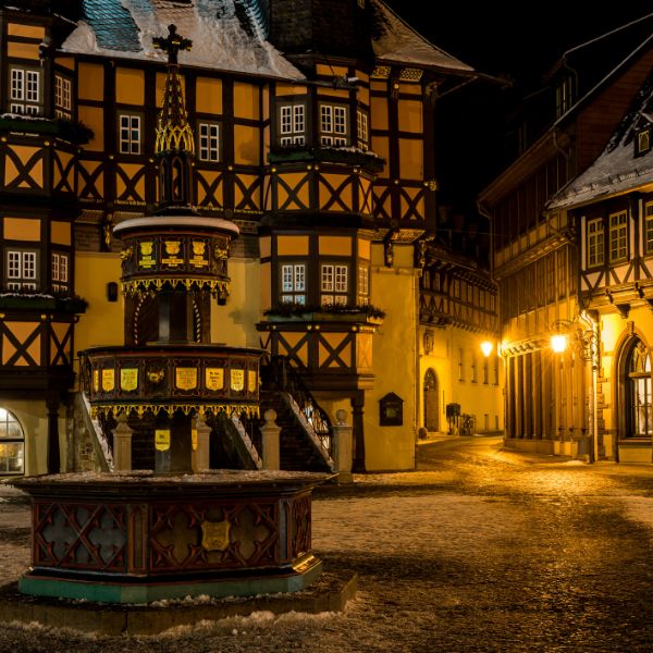 Wernigerode Market Square Wernigerode market square at night with fountain and half-timbered houses lit by street lights
