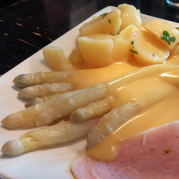 White Asparagus served with Hollandaise sauce and ham