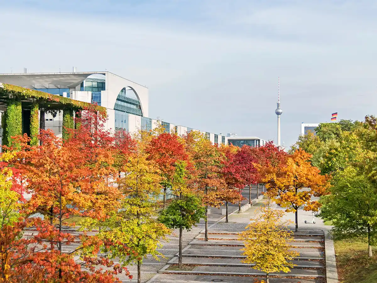 Autumn trees in Berlin’s government quarter with Fernsehturm in background