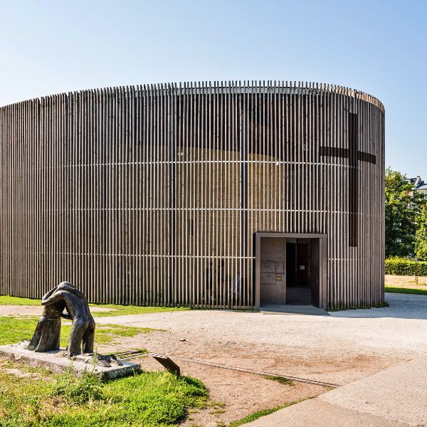 Chapel building with cross and statue