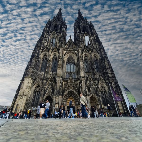 Cologne Cathedral, Germany Cologne Cathedral, Germany: grey cathedral with twin spires and people in front of it