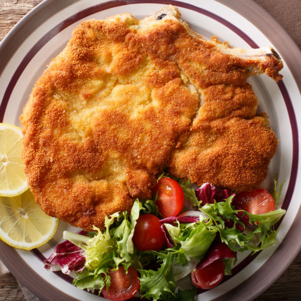 Veal Milanese (Cotoletta Alla Milanese) with lemon. Not boneless!