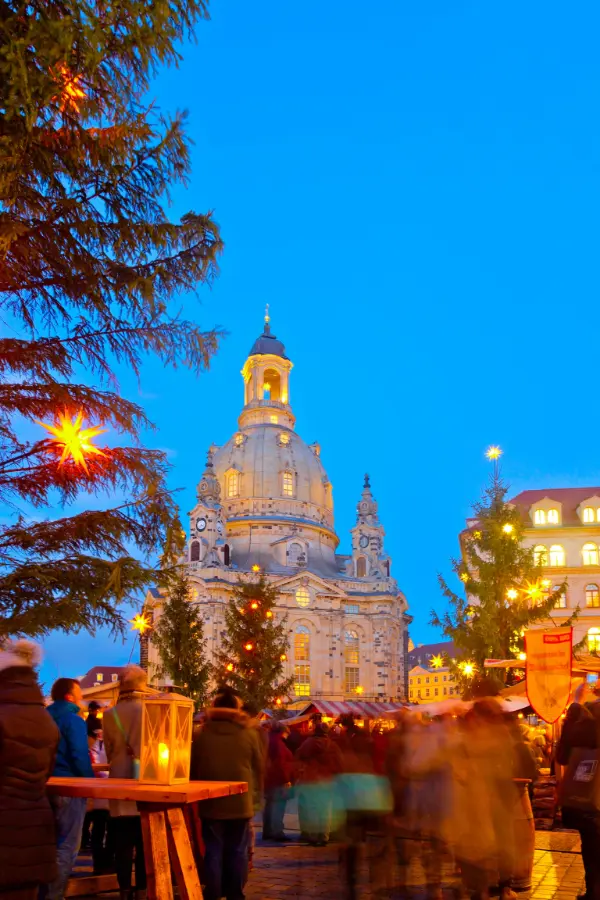 Dresden Striezelmarkt featuring the world’s largest Erzgebirge step pyramid and festive stalls.