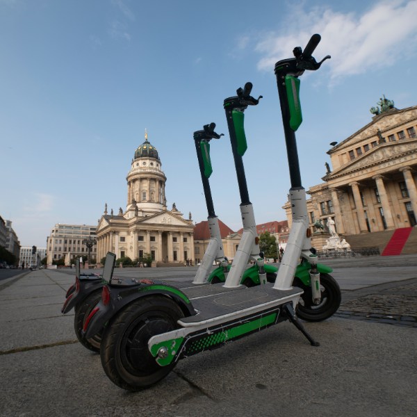 Berlin e-scooters parked by Deutscher Dom e-scooters parked in front of Deutscher Dom in Berlin.