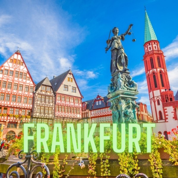 Frankfurt text and half-timbered houses, statue and church steeple. 