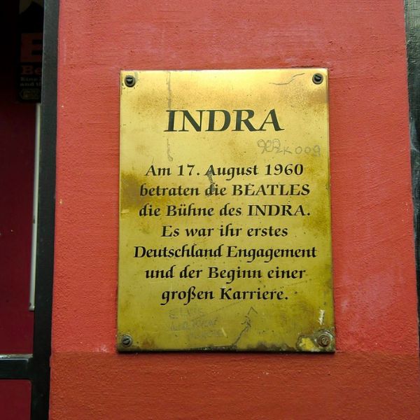 Brass plaque of the Beatles playing at the Indra Club