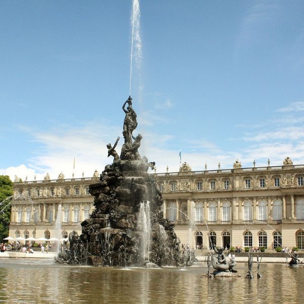 Herrenchiemsee Palace and its intricate fountain out front