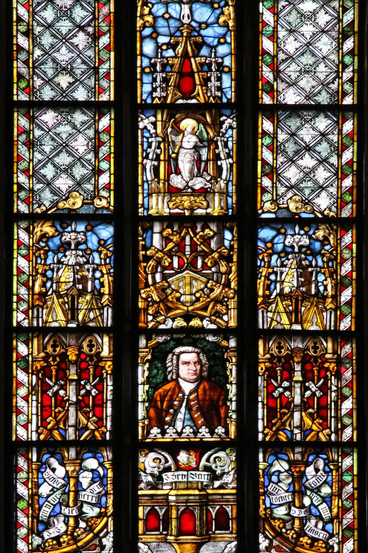 Colourful stained glass in St. Thomas Church in Leipzig