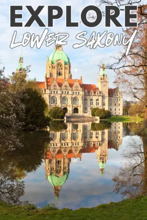 New Town Hall in Hannover behind a still-water pond.