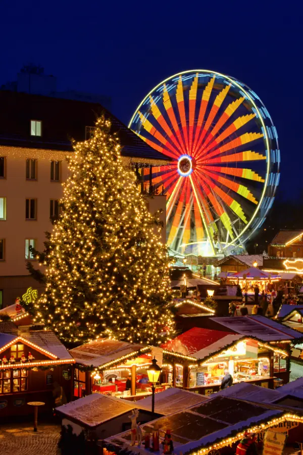 Magdeburg Christmas Market featuring a whimsical fairytale forest and festive stalls for family fun.
