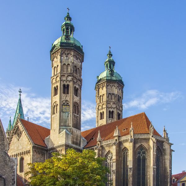 Naumburg Cathedral, Germany Naumburg Cathedral, Germany: grey building with twin copper-topped spires and red tile roof