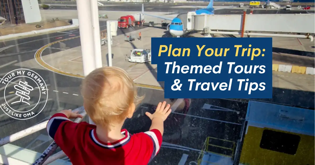 Young child looking out an airport terminal window at airplanes on the tarmac, symbolizing the start of a travel adventure.