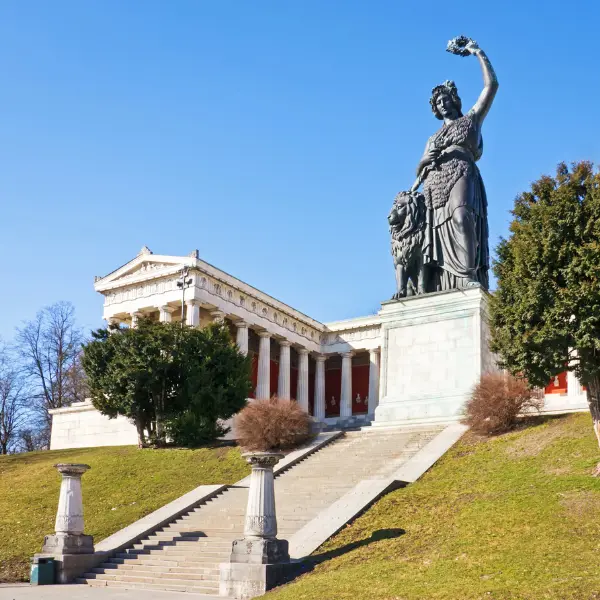 Bronze Statue of Bavaria and pillared building behind.