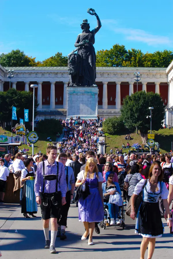 People gathered around the steps leading up to the Statue of Bavaria