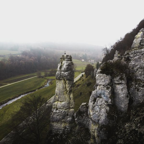 Swabian Jura, Germany rock outcropping and cliffs overlooking fields in Swabian Jura, Germany