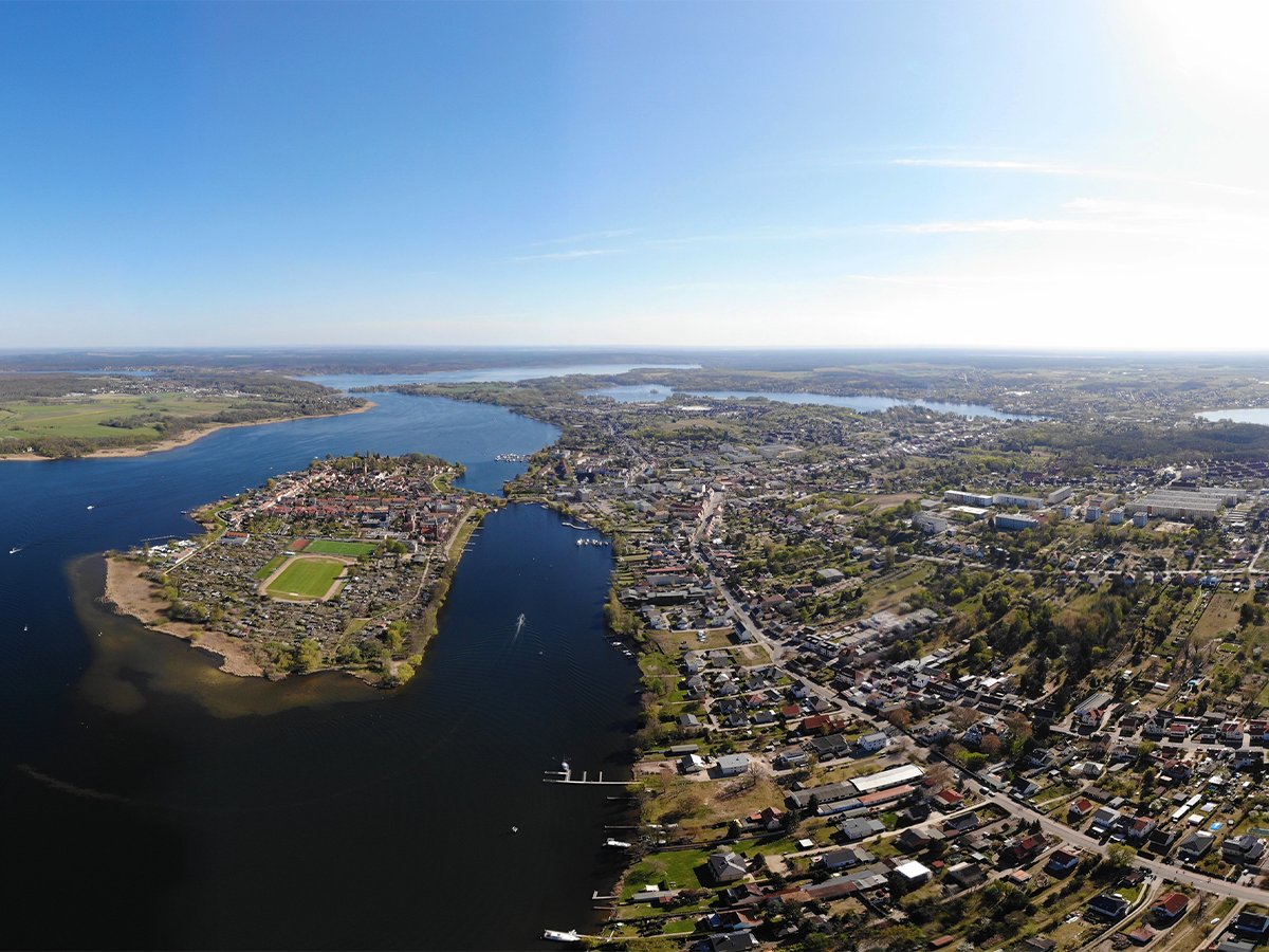 Aerial view of Werder (Havel) island town in blue Havel lakes, vineyards and marina—scenic Brandenburg day-trip spot.