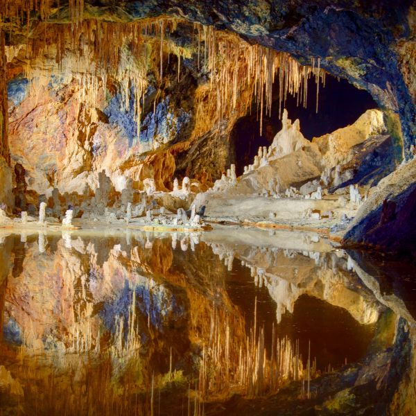 Underground lake with colourful rock formations