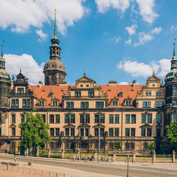 Dresden Palace with red brick roof against blue sky