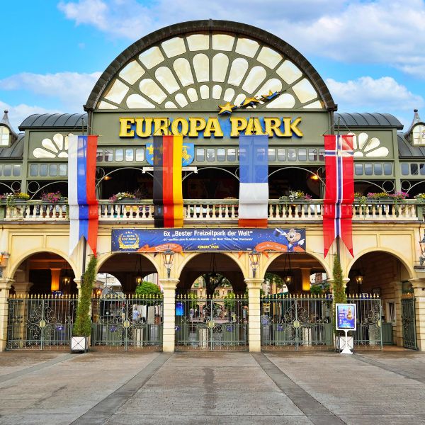 Theme park entrance with flags