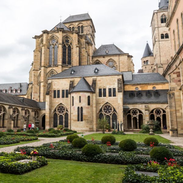 Cathedral of St. Peter, Germany: grey buildings and green lawn courtyard